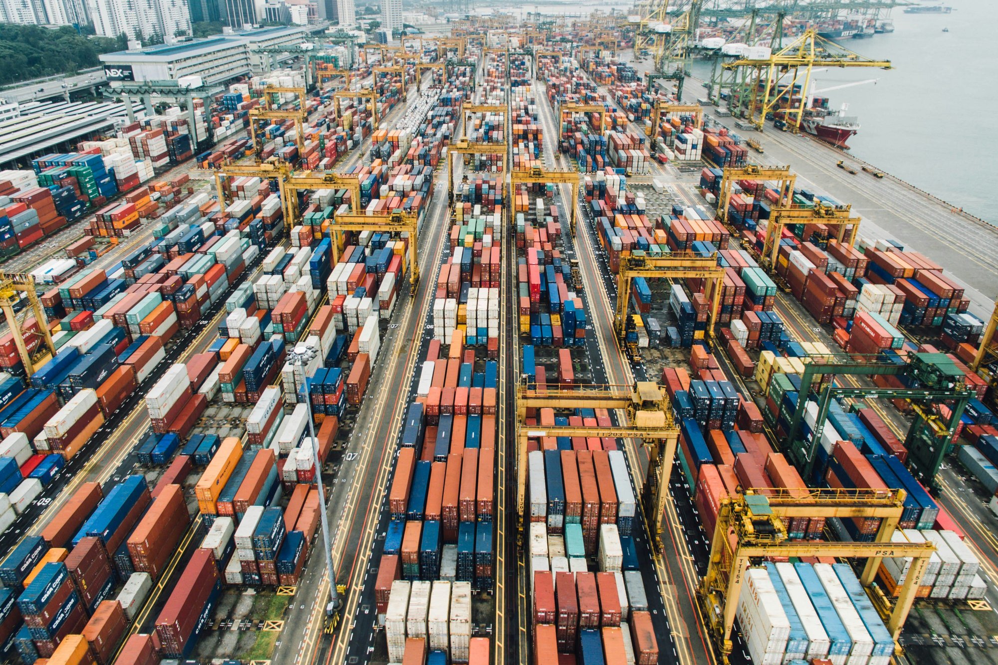 Photo of a shipping port by CHUTTERSNAP via Unsplash